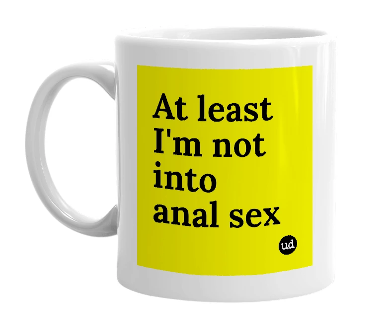 White mug with 'At least I'm not into anal sex' in bold black letters