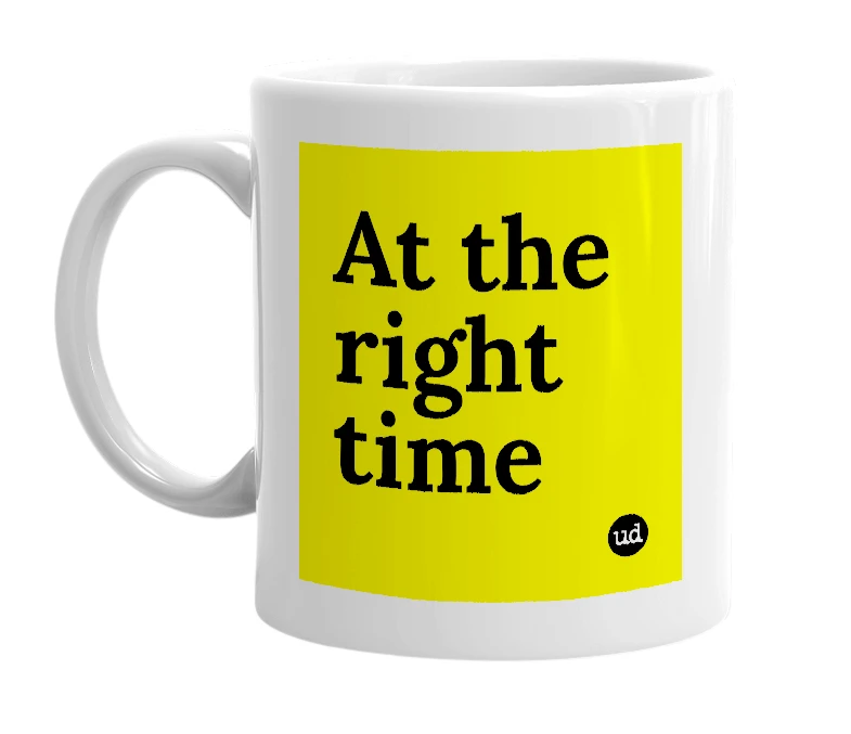 White mug with 'At the right time' in bold black letters