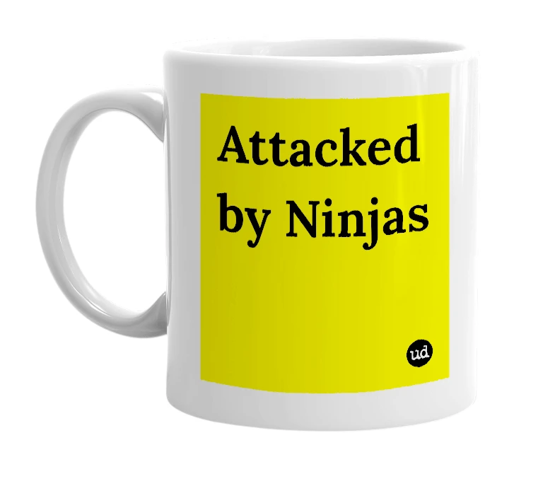 White mug with 'Attacked by Ninjas' in bold black letters