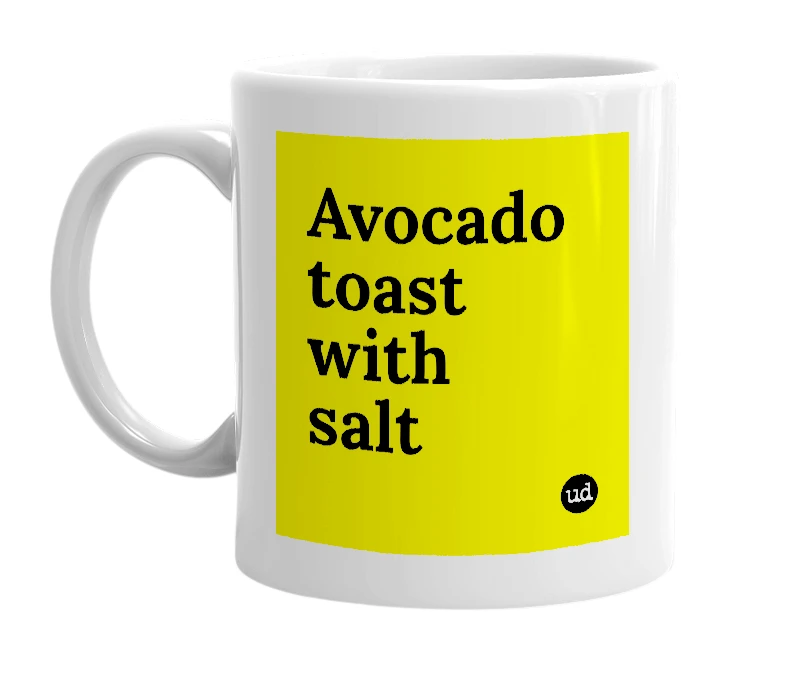 White mug with 'Avocado toast with salt' in bold black letters