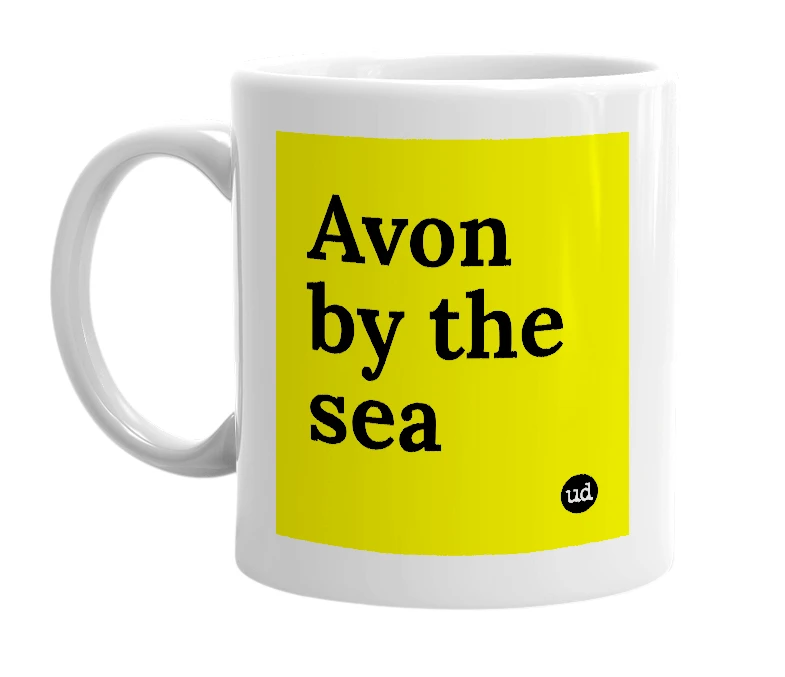 White mug with 'Avon by the sea' in bold black letters