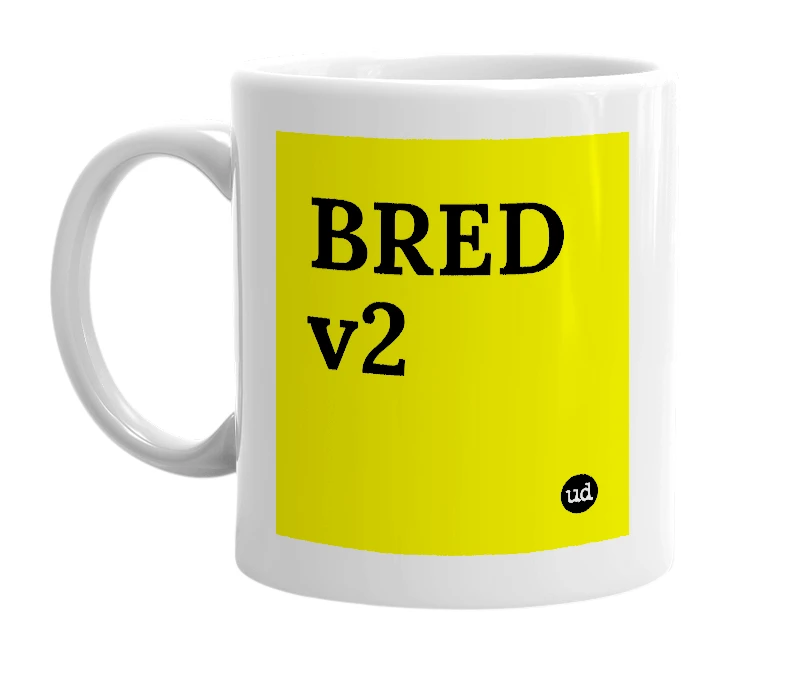 White mug with 'BRED v2' in bold black letters