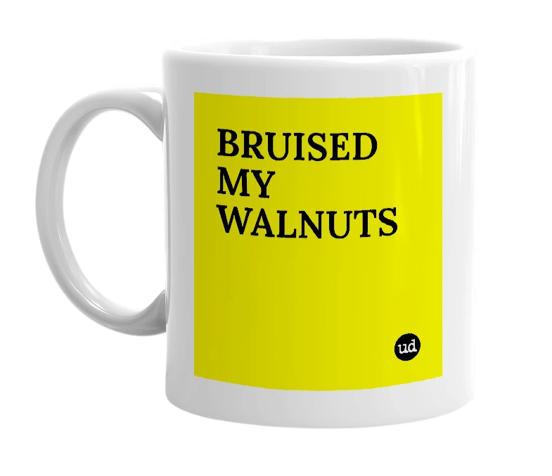 White mug with 'BRUISED MY WALNUTS' in bold black letters