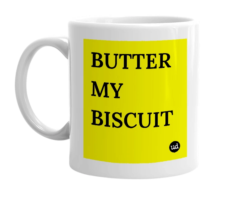 White mug with 'BUTTER MY BISCUIT' in bold black letters