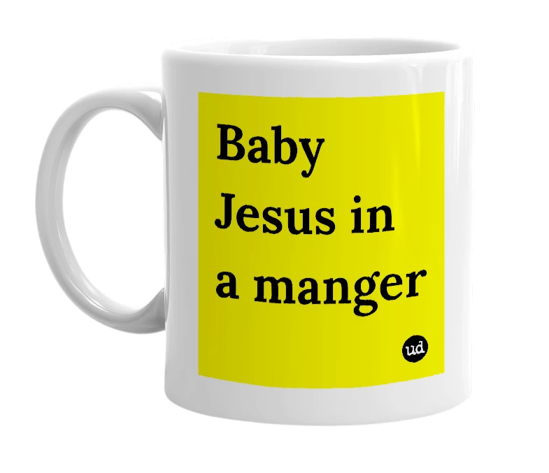 White mug with 'Baby Jesus in a manger' in bold black letters