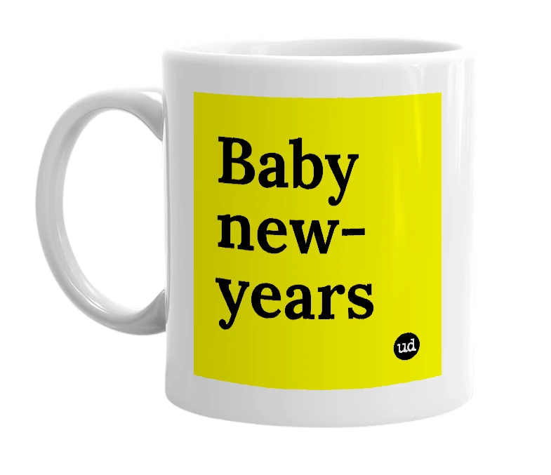 White mug with 'Baby new-years' in bold black letters