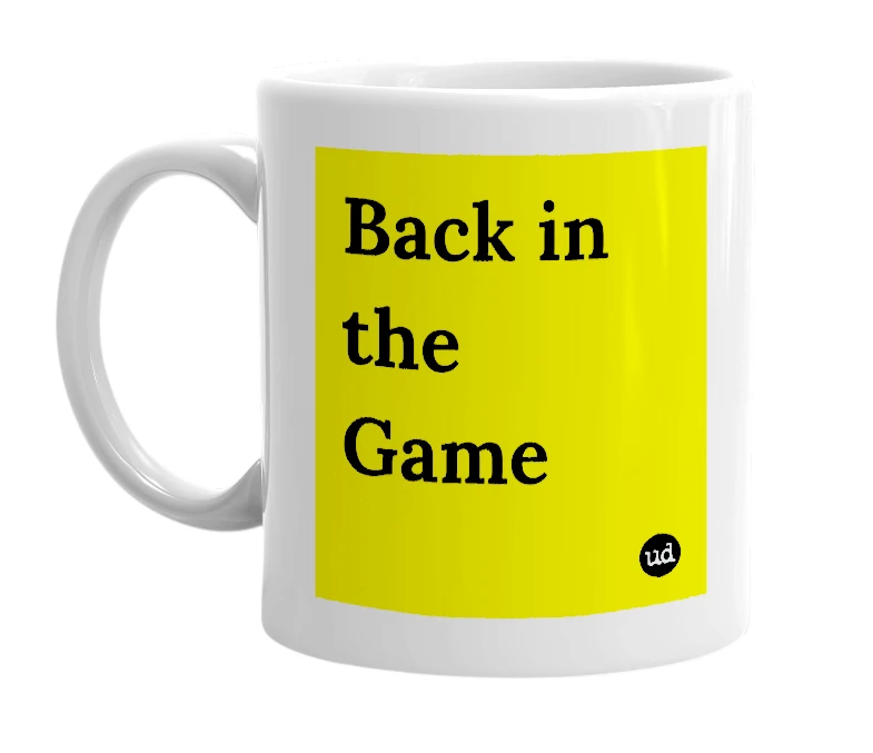 White mug with 'Back in the Game' in bold black letters