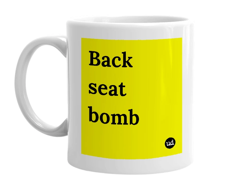 White mug with 'Back seat bomb' in bold black letters