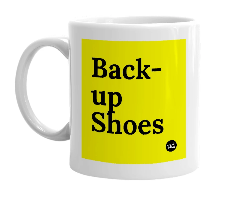 White mug with 'Back-up Shoes' in bold black letters