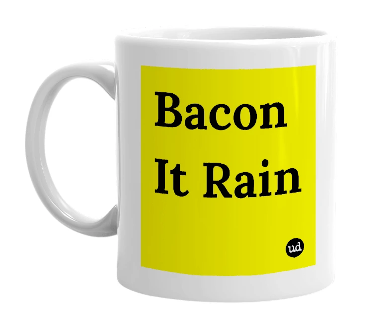 White mug with 'Bacon It Rain' in bold black letters