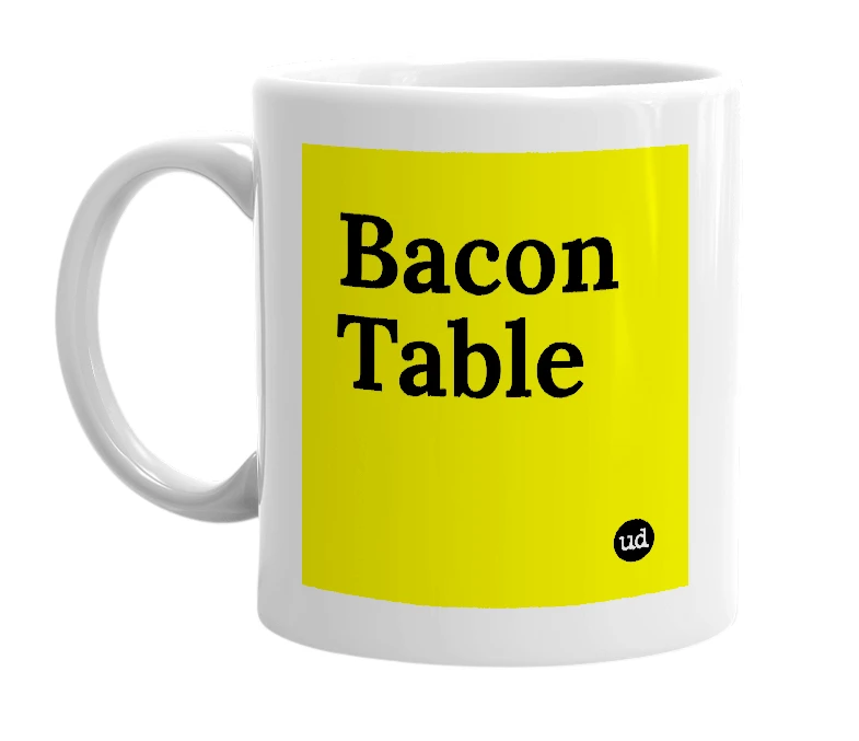 White mug with 'Bacon Table' in bold black letters