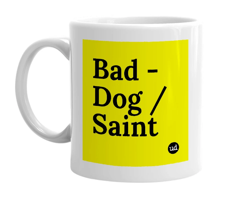 White mug with 'Bad - Dog / Saint' in bold black letters