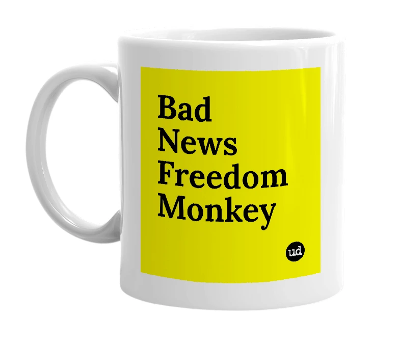 White mug with 'Bad News Freedom Monkey' in bold black letters