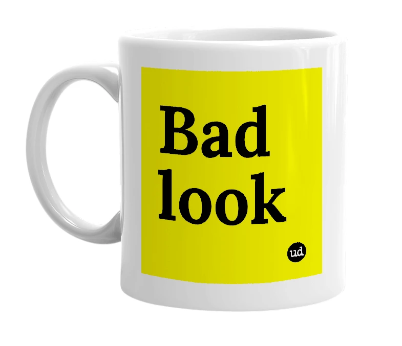 White mug with 'Bad look' in bold black letters