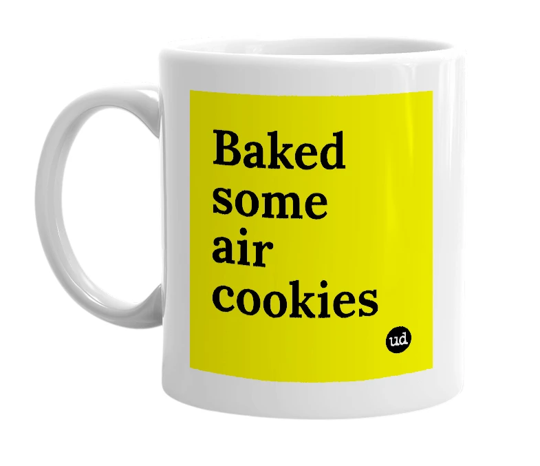 White mug with 'Baked some air cookies' in bold black letters