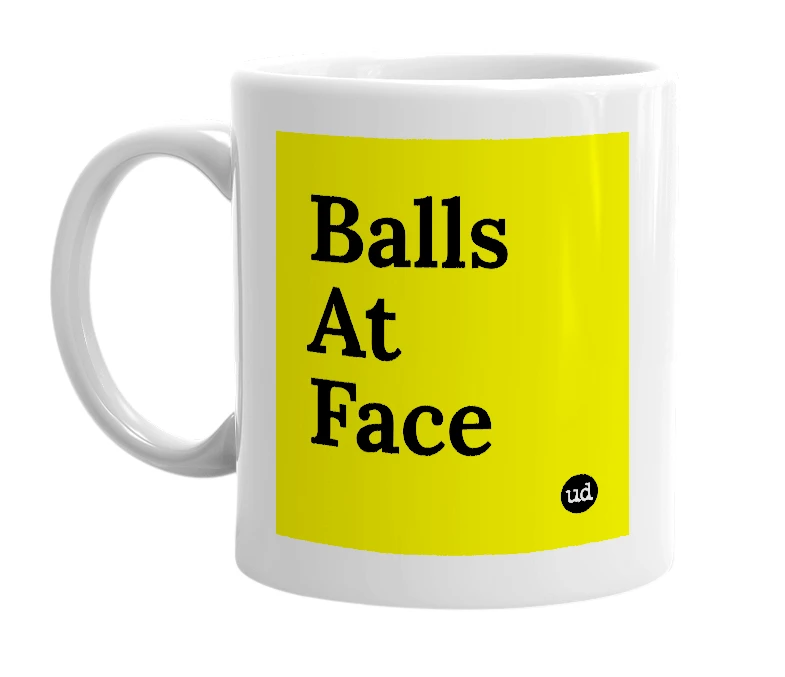 White mug with 'Balls At Face' in bold black letters