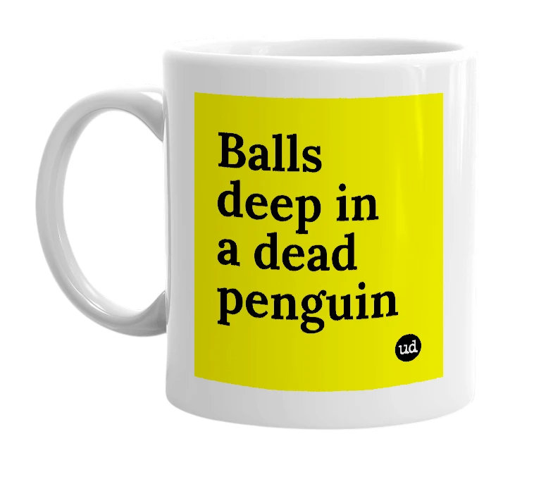 White mug with 'Balls deep in a dead penguin' in bold black letters