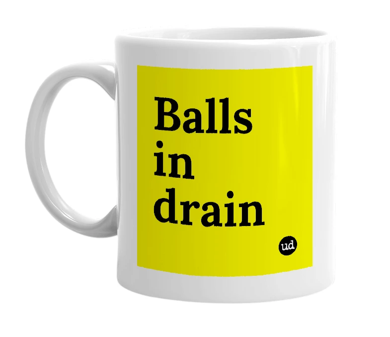 White mug with 'Balls in drain' in bold black letters