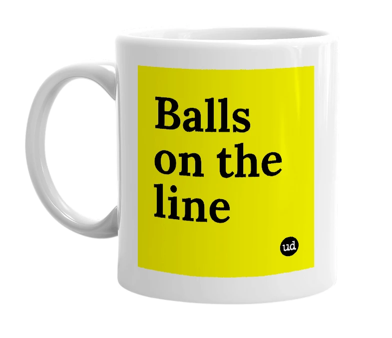 White mug with 'Balls on the line' in bold black letters