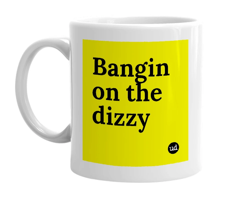 White mug with 'Bangin on the dizzy' in bold black letters