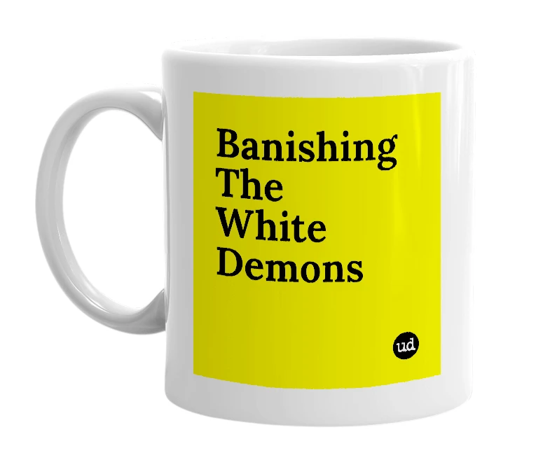 White mug with 'Banishing The White Demons' in bold black letters