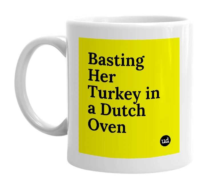 White mug with 'Basting Her Turkey in a Dutch Oven' in bold black letters