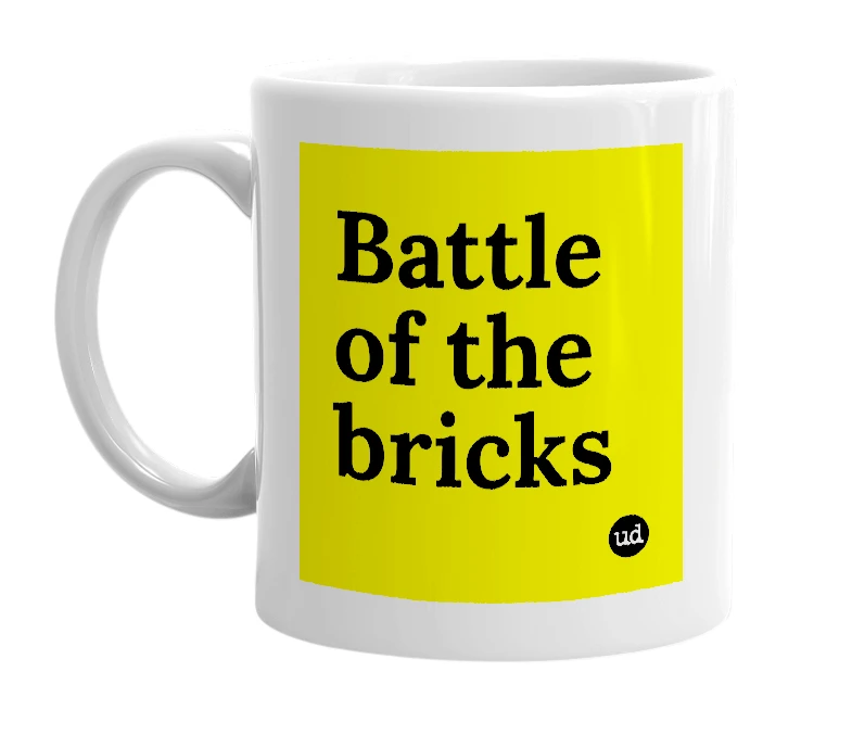 White mug with 'Battle of the bricks' in bold black letters