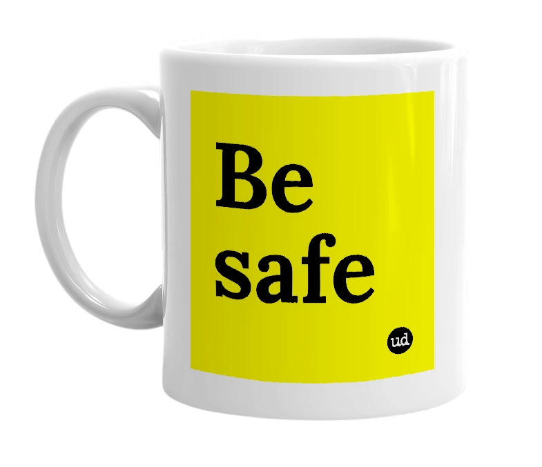 White mug with 'Be safe' in bold black letters