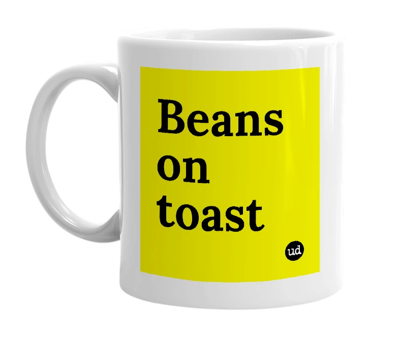White mug with 'Beans on toast' in bold black letters