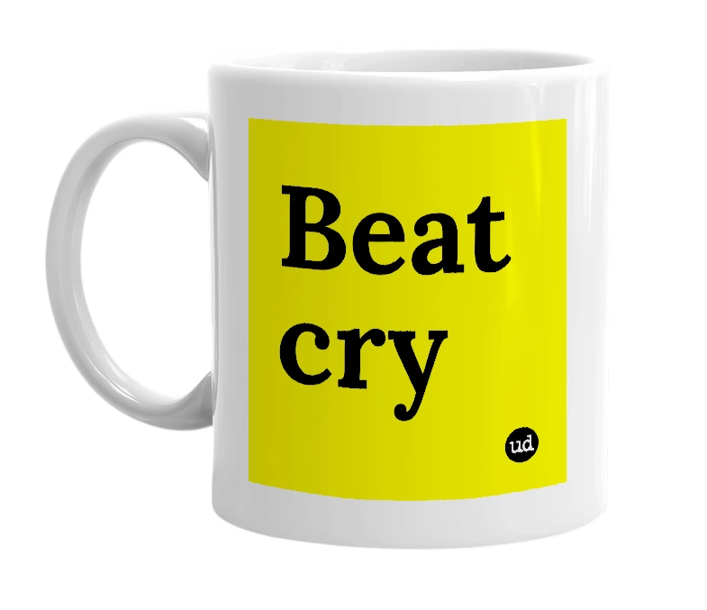 White mug with 'Beat cry' in bold black letters