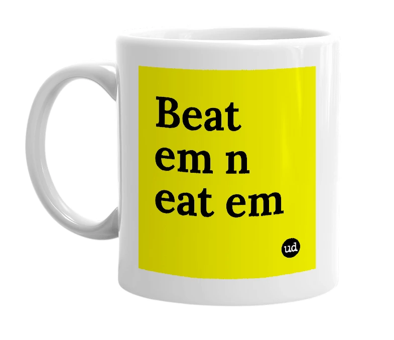 White mug with 'Beat em n eat em' in bold black letters