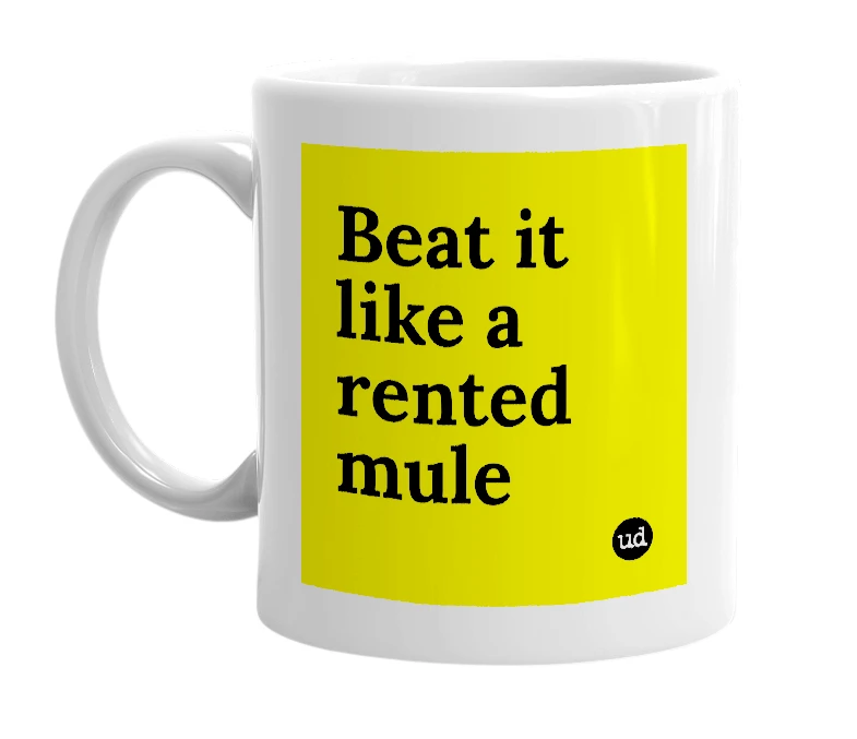 White mug with 'Beat it like a rented mule' in bold black letters