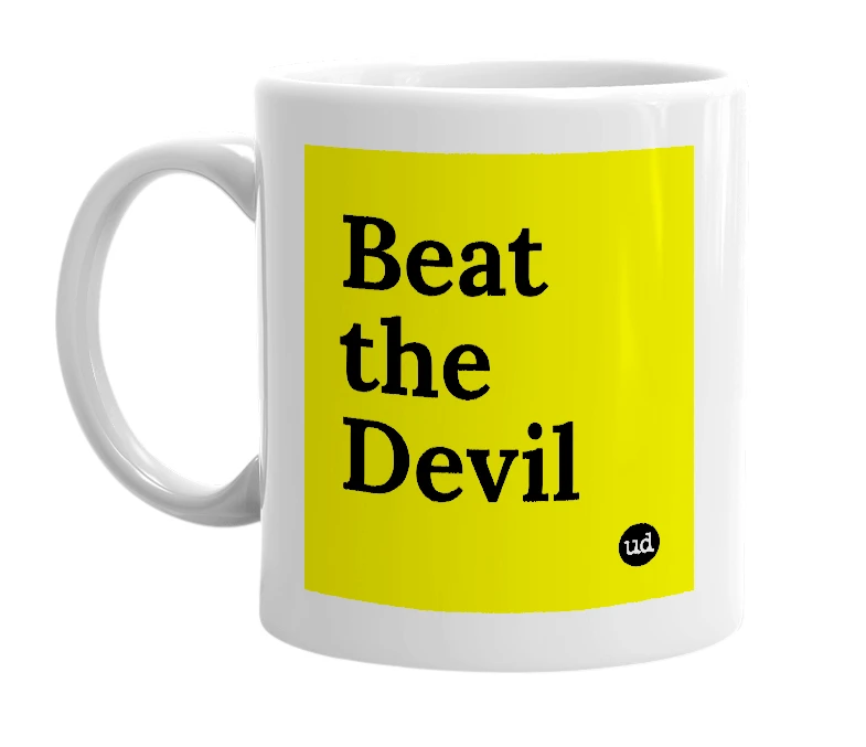 White mug with 'Beat the Devil' in bold black letters