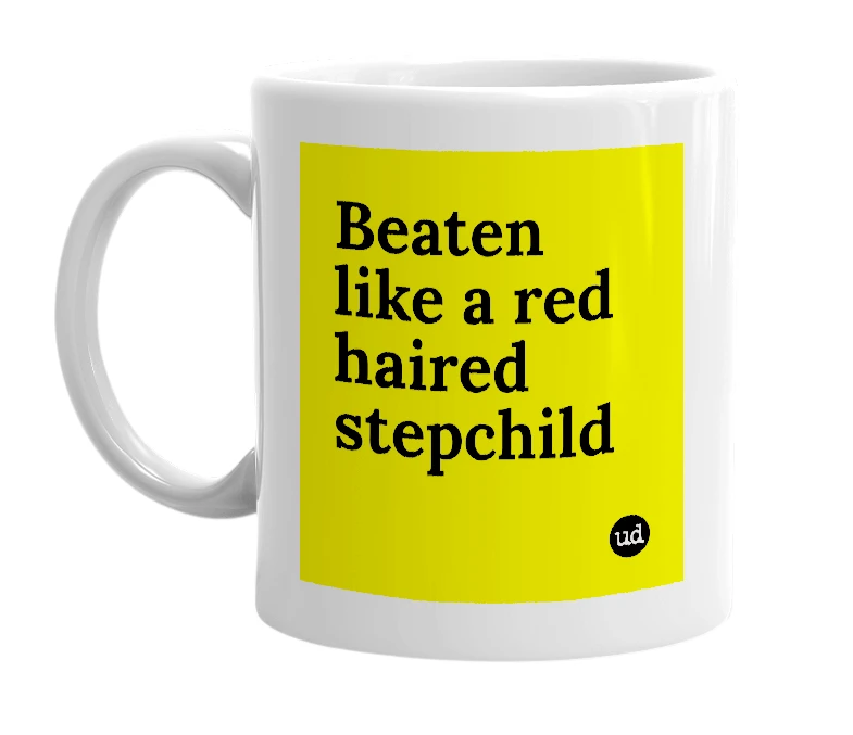 White mug with 'Beaten like a red haired stepchild' in bold black letters