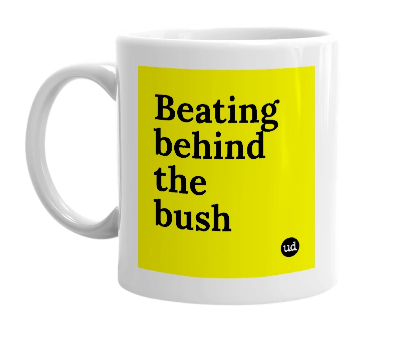 White mug with 'Beating behind the bush' in bold black letters