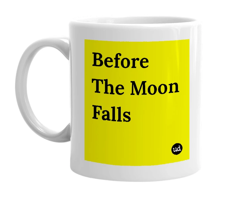 White mug with 'Before The Moon Falls' in bold black letters