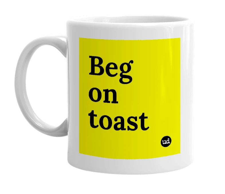 White mug with 'Beg on toast' in bold black letters