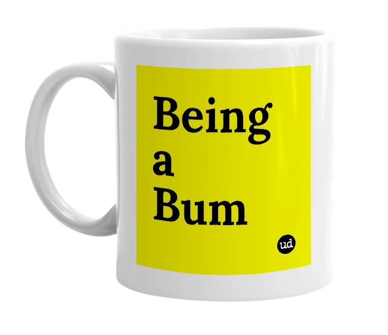 White mug with 'Being a Bum' in bold black letters