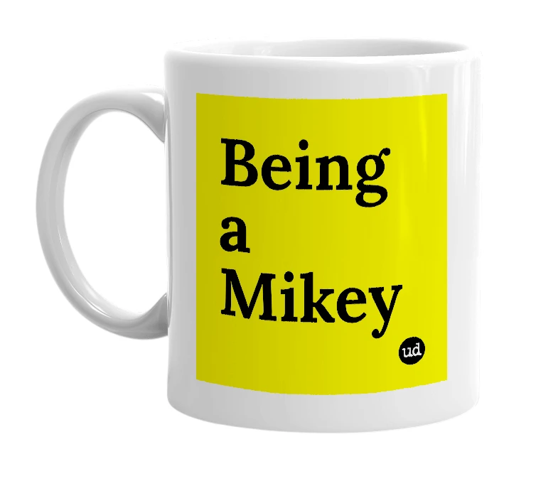 White mug with 'Being a Mikey' in bold black letters