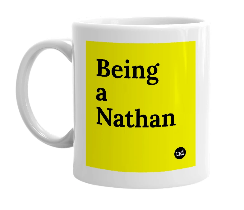 White mug with 'Being a Nathan' in bold black letters