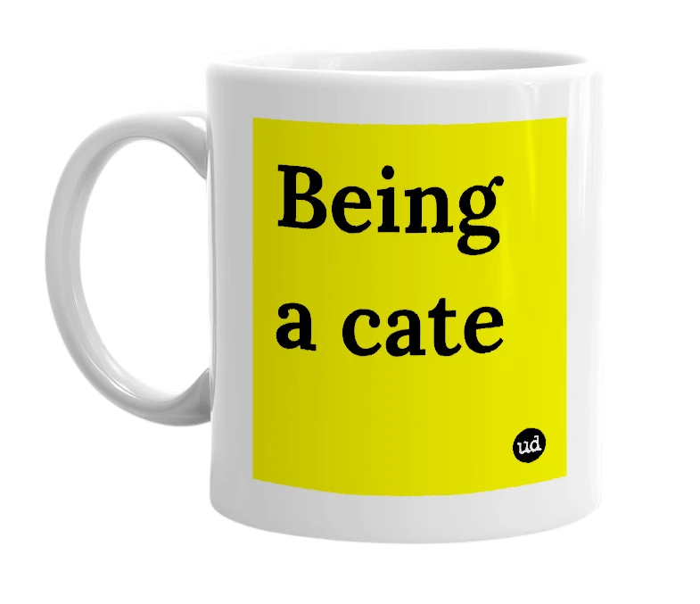White mug with 'Being a cate' in bold black letters