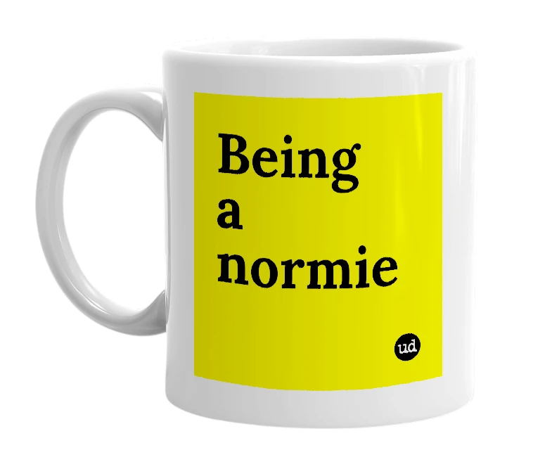 White mug with 'Being a normie' in bold black letters