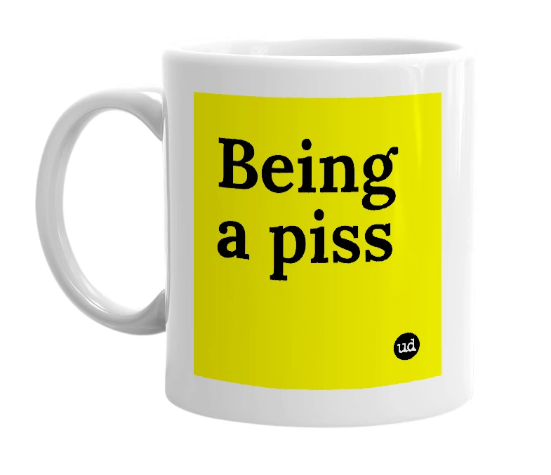 White mug with 'Being a piss' in bold black letters