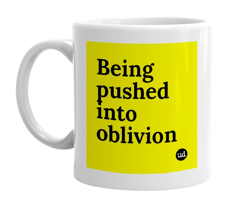 White mug with 'Being pushed into oblivion' in bold black letters