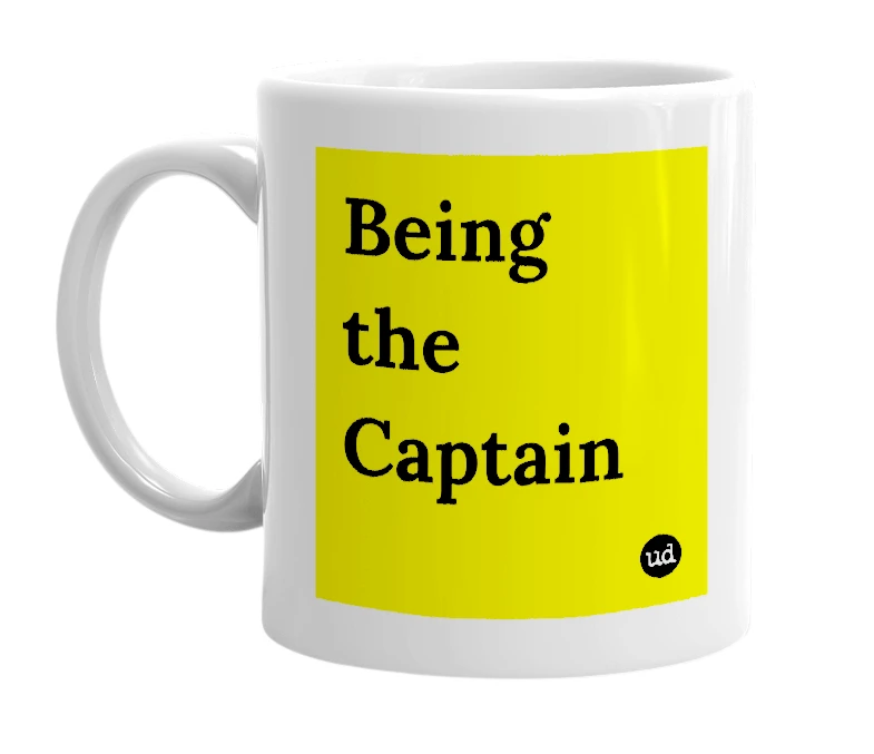 White mug with 'Being the Captain' in bold black letters