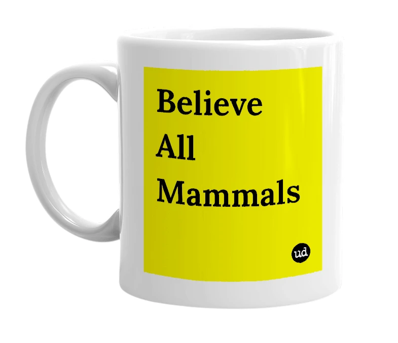White mug with 'Believe All Mammals' in bold black letters