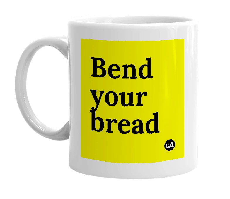 White mug with 'Bend your bread' in bold black letters