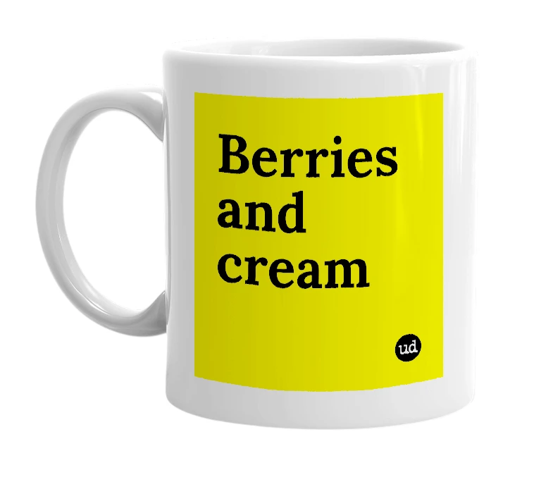 White mug with 'Berries and cream' in bold black letters