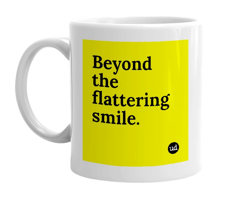 White mug with 'Beyond the flattering smile.' in bold black letters