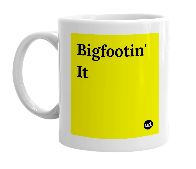 White mug with 'Bigfootin' It' in bold black letters